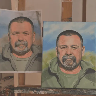 Painted portrait of a man next to the model himself